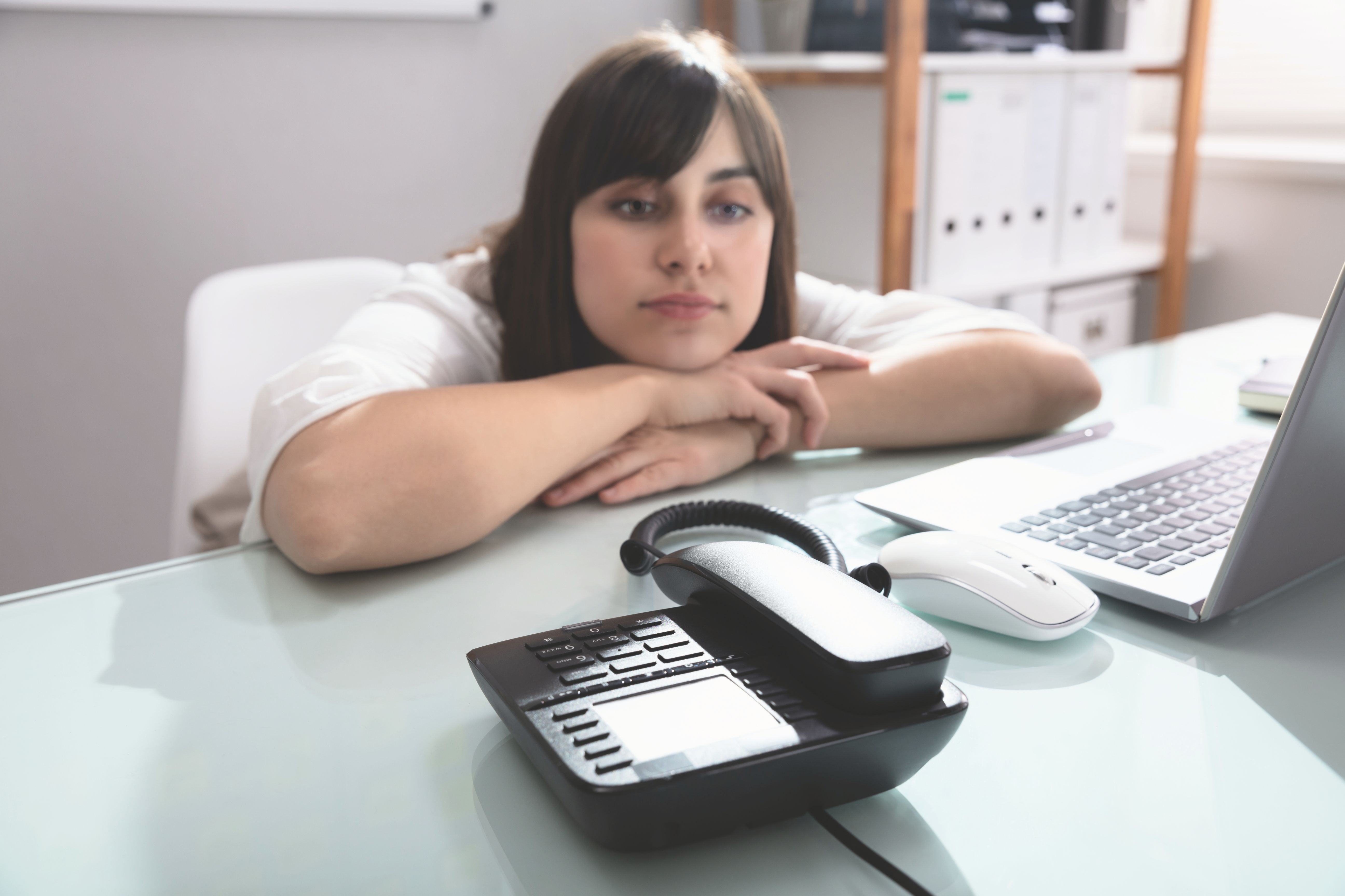 Small business owner waits to hear from her accountant.